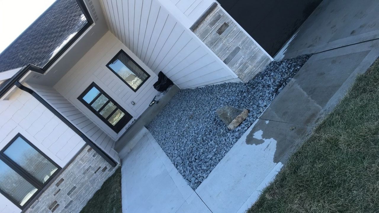 Home exterior renovation with new siding and front porch